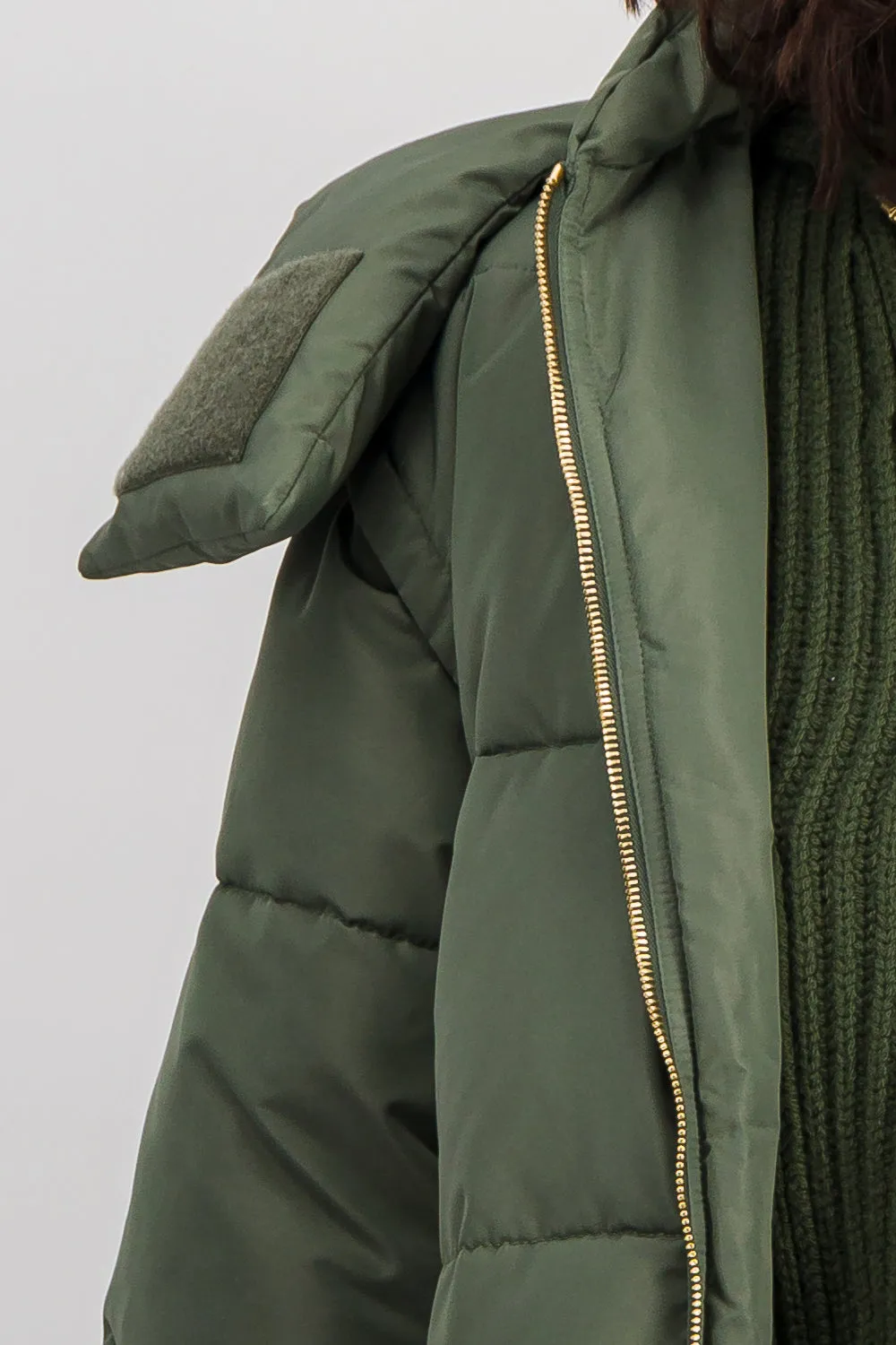 Oversized parka with detachable sleeves