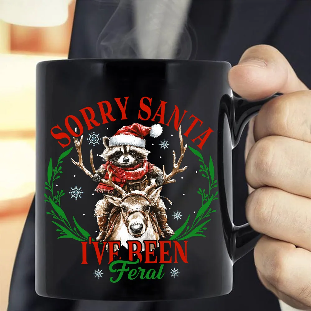 Teesdily | Sorry Santa I've Been Feral Shirt, Christmas Raccoon Shirt, Raccoon Santa Reindeer Sweatshirt Hoodie Mug, Family Gift