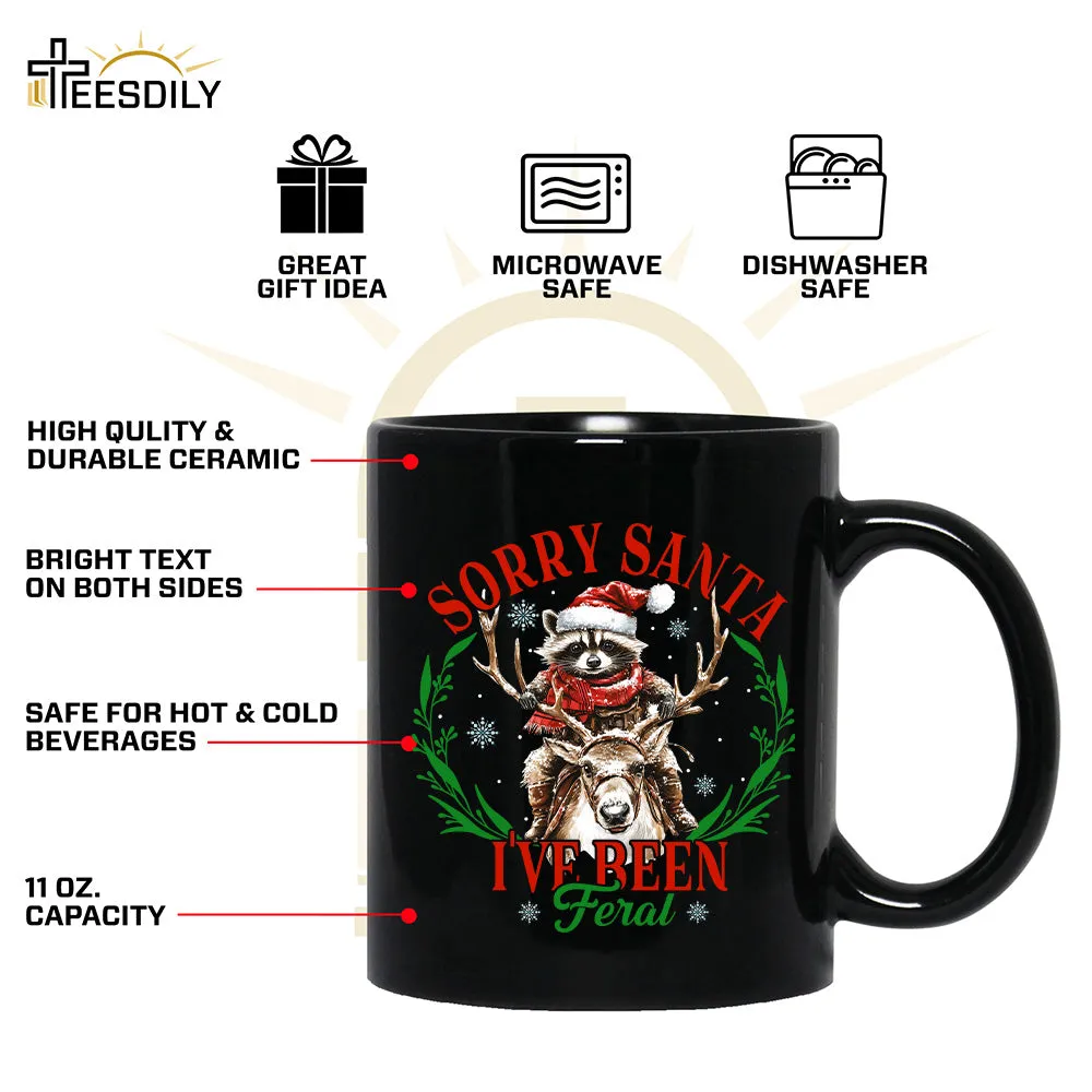 Teesdily | Sorry Santa I've Been Feral Shirt, Christmas Raccoon Shirt, Raccoon Santa Reindeer Sweatshirt Hoodie Mug, Family Gift